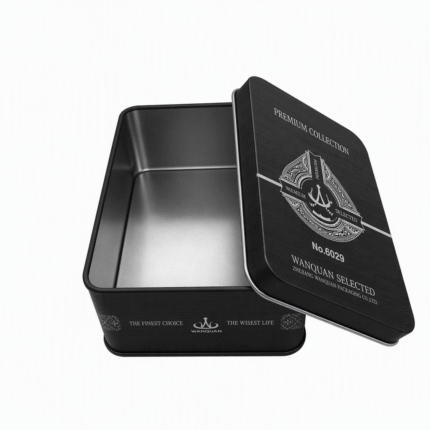 Rectangular black storage tin lid open showing sticker collection