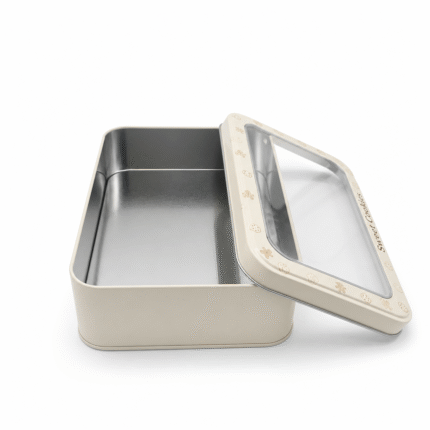 Open metal biscuit tin box with clear viewing lid